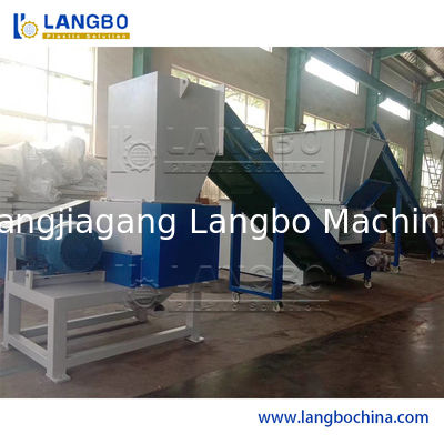 Double Shaft Waste Cardboard Paper Tire Rubber Metal Scrap Wood Lump Barrels Drums Pipe and Plastic Shredder for Recycling Machine